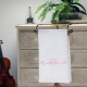 Geschirrtuch 50 x 70 cm, weiß mit einem Herz und einem Notenschlüssel bestickt