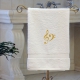 Handtuch weiß, mit goldfarbenen Klavier Notenschlüsseln bestickt, in verschiedenen Größen