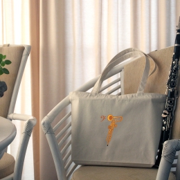 Stabile Tragetasche mit einem Cimbasso bestickt, aus naturweißer Baumwolle mit Reißverschluss